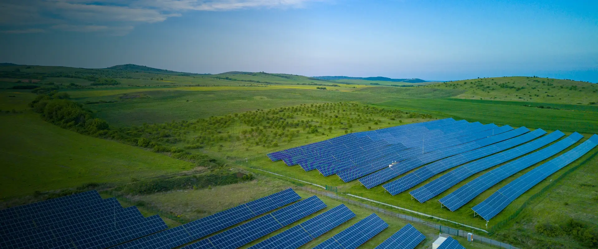 Solar panels in a sunlit landscape, from the existing Saigeri website